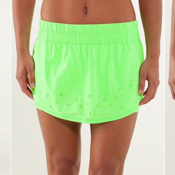 lululemon athletica Dresses & Skirts - Lululemon Running Breeze Laser cut skirt green neon 10 size